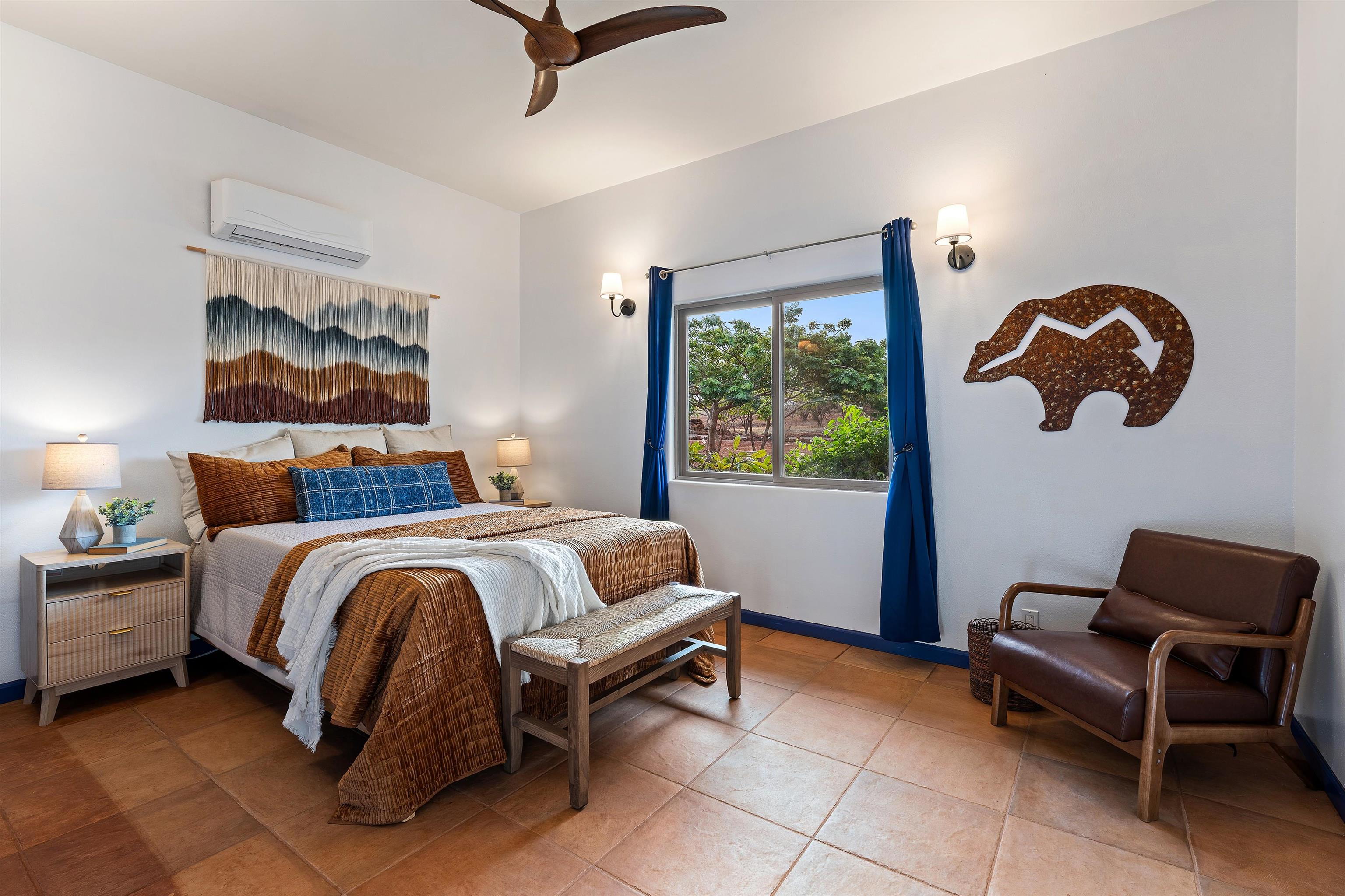 3820 Kalua Koi Road Maunaloa, HI 96770 - Photo 25 of 46 a bedroom with bed and a window