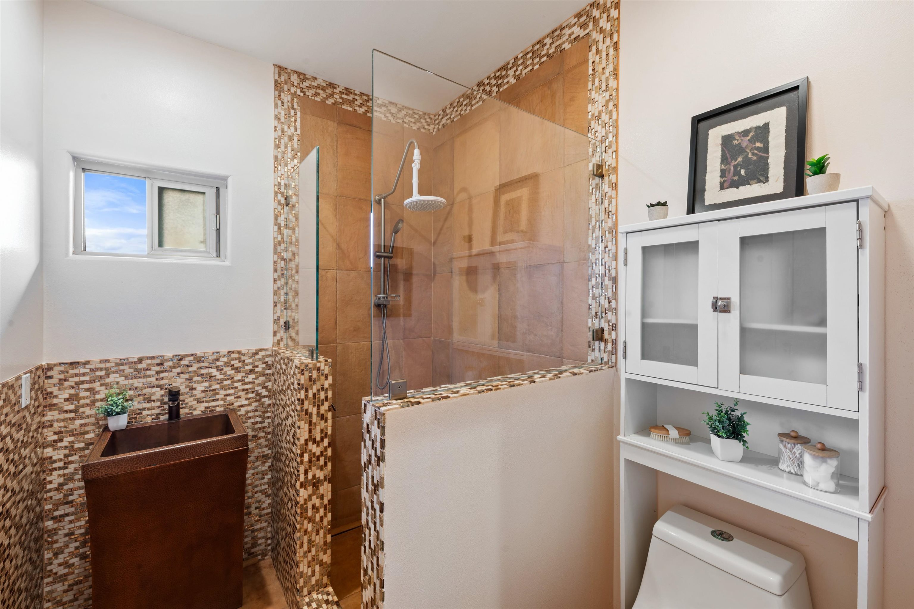 3820 Kalua Koi Road Maunaloa, HI 96770 - Photo 29 of 46 a bathroom with a sink and a mirror