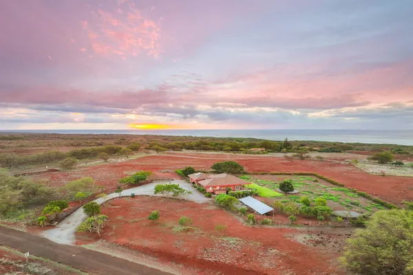 a view of an ocean with beach