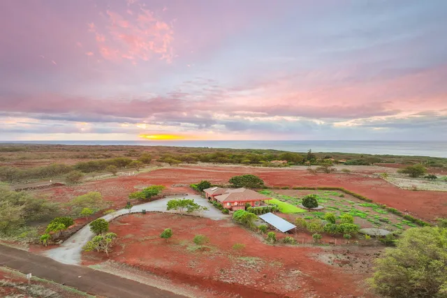 a view of an ocean with beach