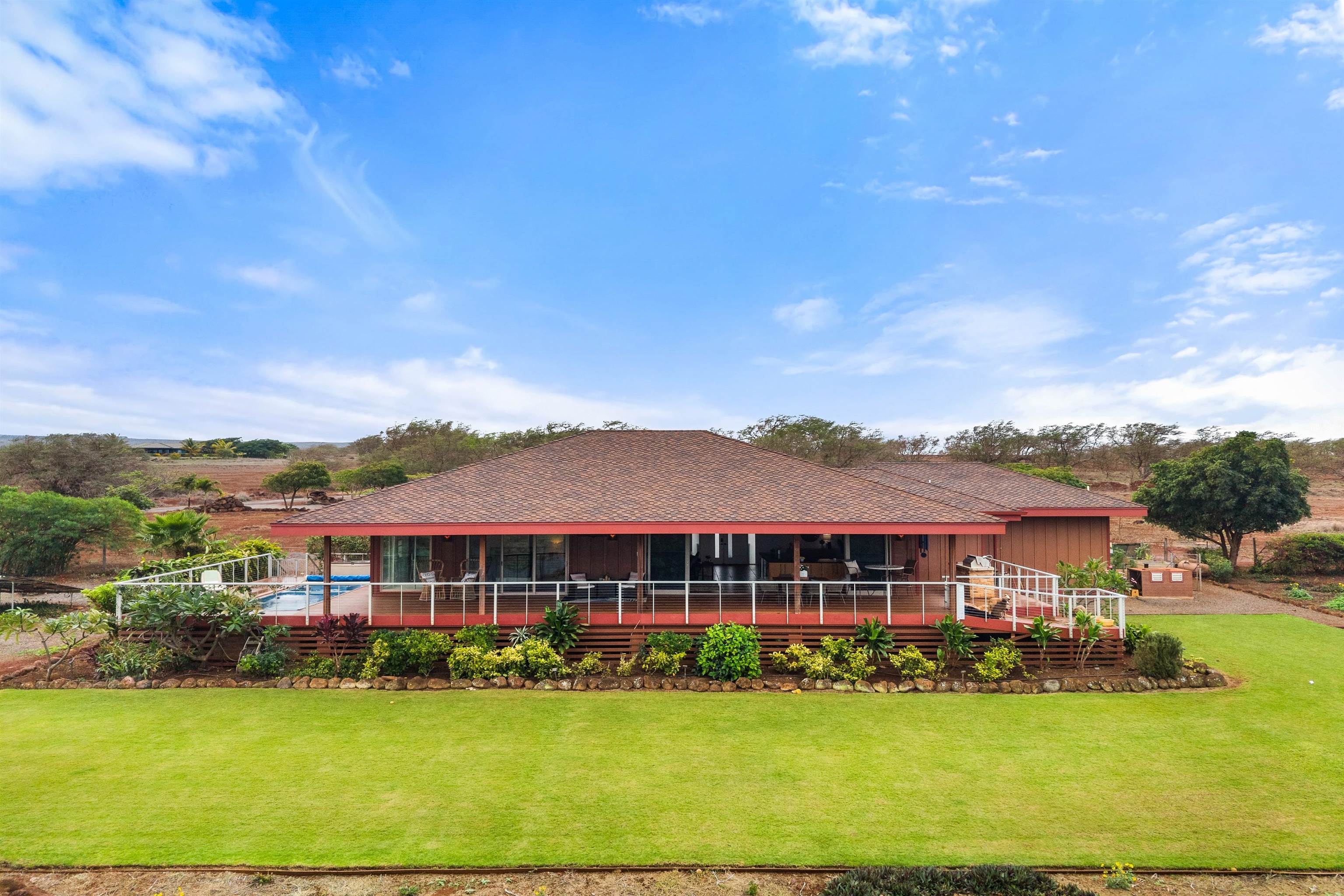 3820 Kalua Koi Road Maunaloa, HI 96770 - Photo 41 of 46 a view of a house with a big yard