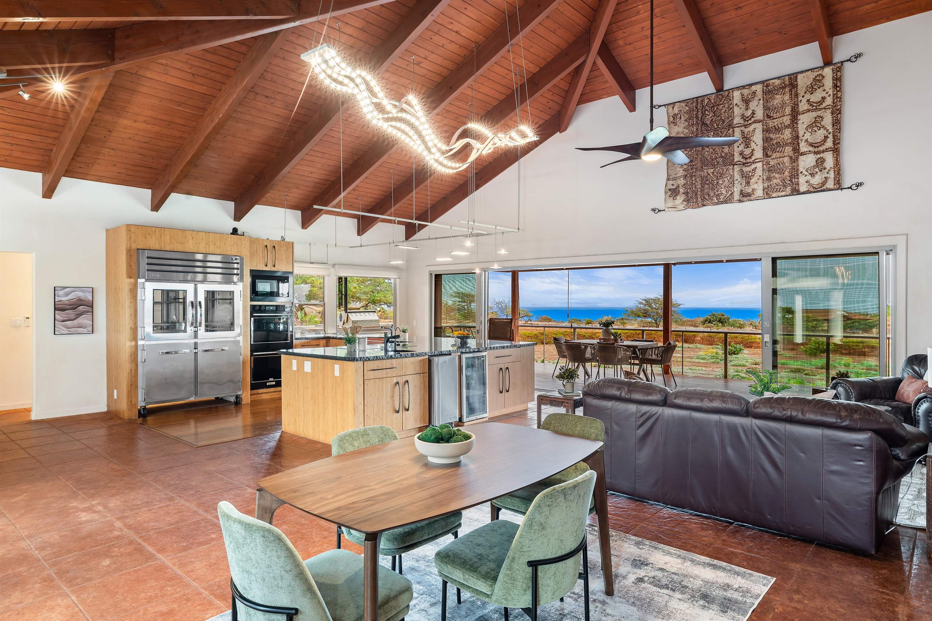 3820 Kalua Koi Road Maunaloa, HI 96770 - Photo 5 of 46 a view of a dining room with furniture window and outside view