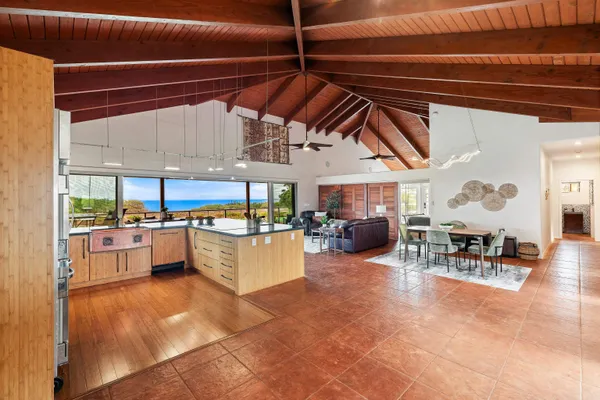 a view of a swimming pool with outdoor seating