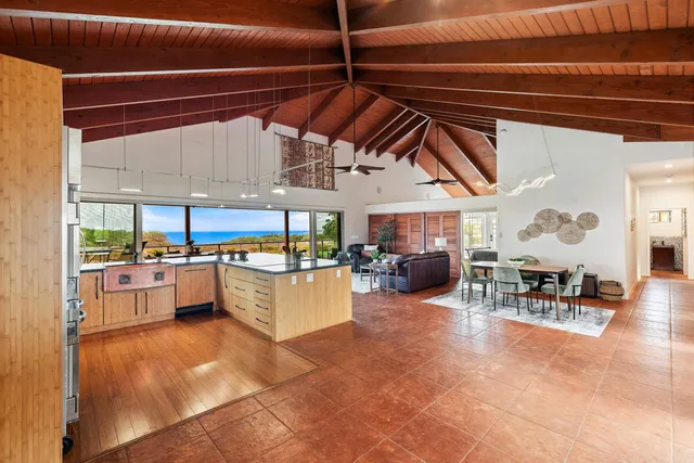 a view of a swimming pool with outdoor seating