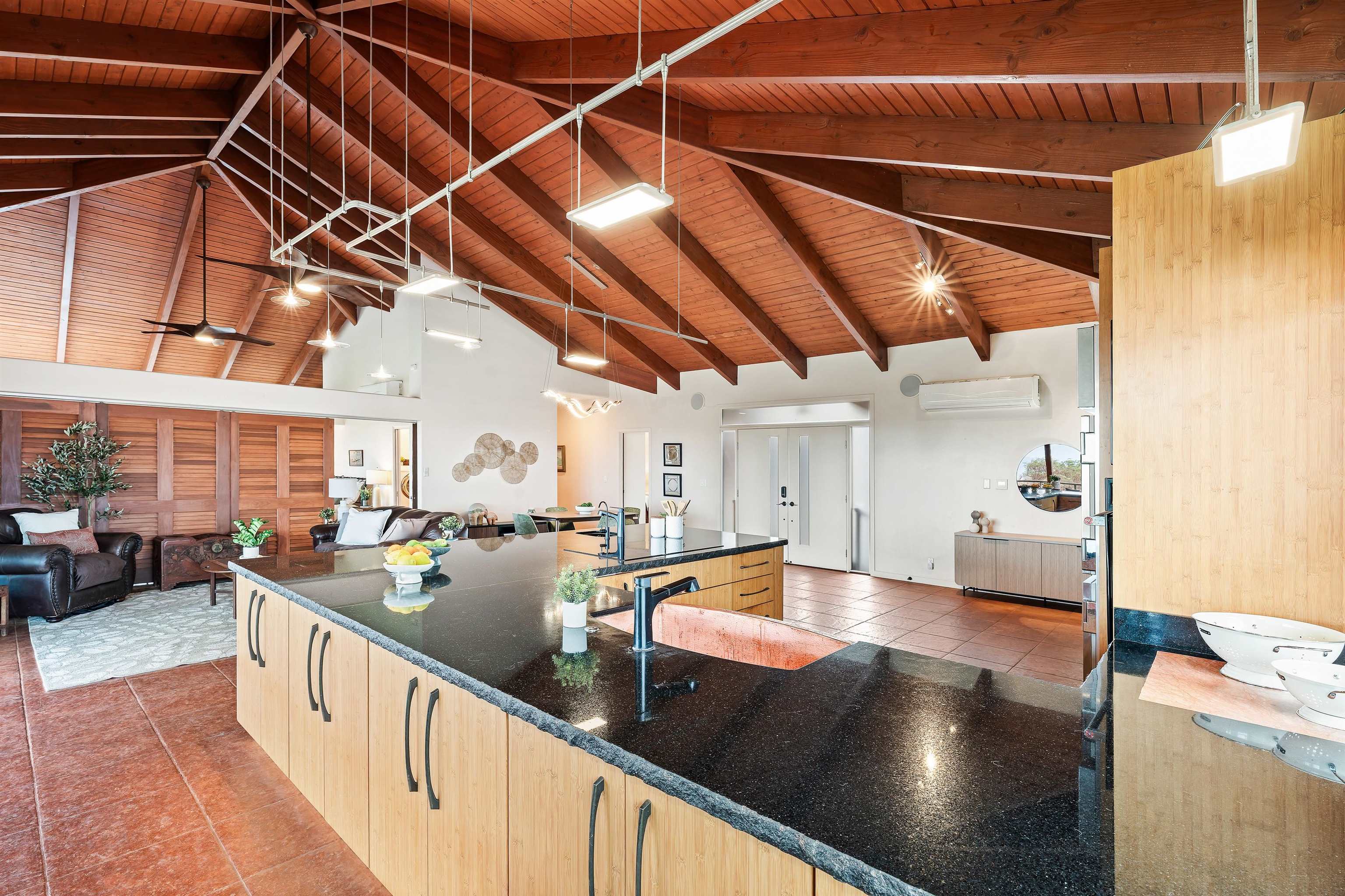 3820 Kalua Koi Road Maunaloa, HI 96770 - Photo 9 of 46 a view of a kitchen with a sink and a dishwasher