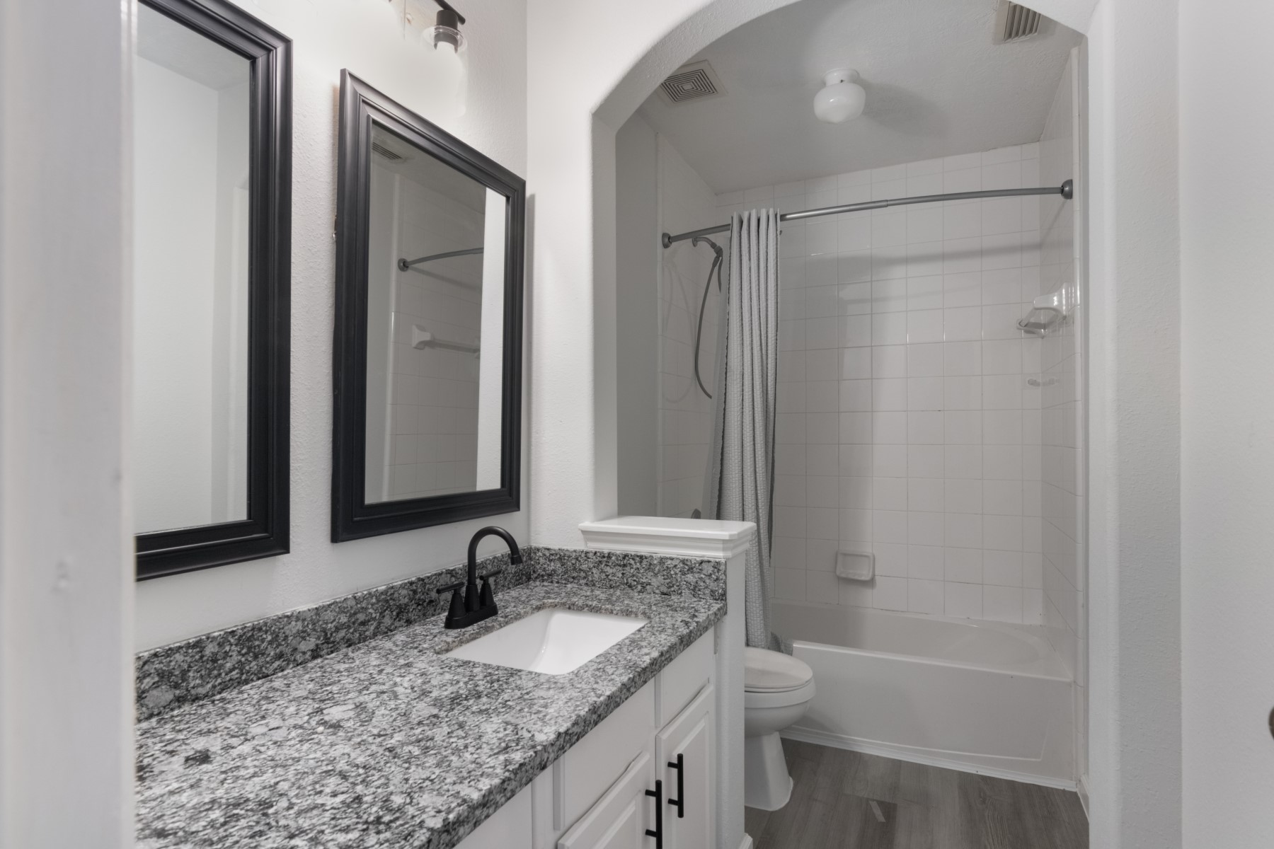 5326 Coast Line Street Baytown, TX 77521 - Photo 21 of 26 a bathroom with a granite countertop sink toilet and shower