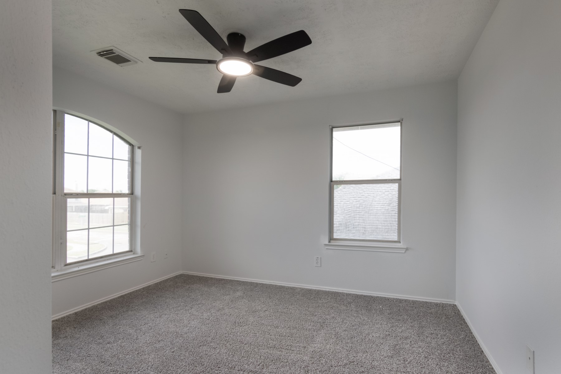 5326 Coast Line Street Baytown, TX 77521 - Photo 22 of 26 an empty room with a window