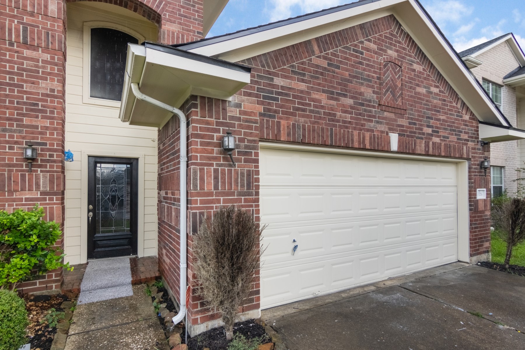 5326 Coast Line Street Baytown, TX 77521 - Photo 3 of 26 a view of a house with a small porch
