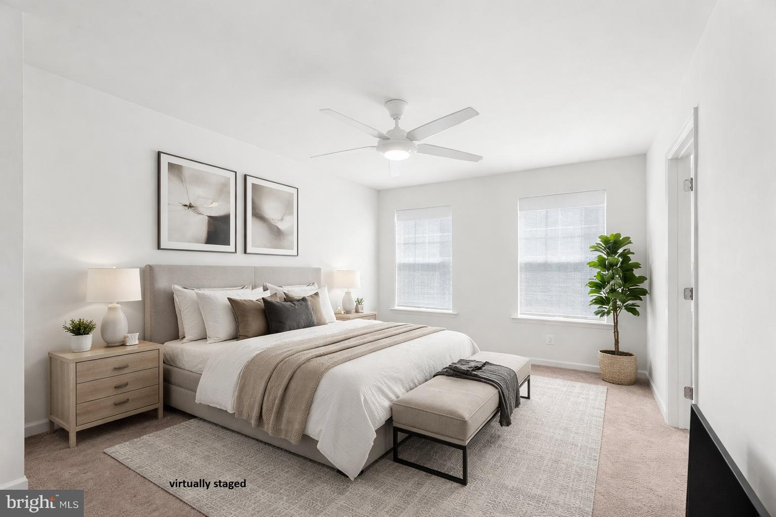 520 Marshy Cove, Unit 163 Cambridge, MD 21613 - Photo 21 of 42 a bedroom with a bed and a couch