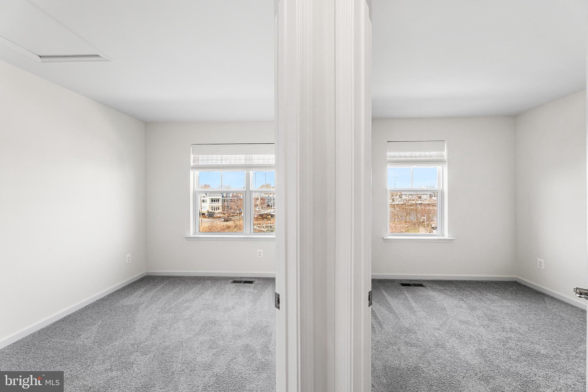 520 Marshy Cove, Unit 163 Cambridge, MD 21613 - Photo 25 of 42 an empty room with a window