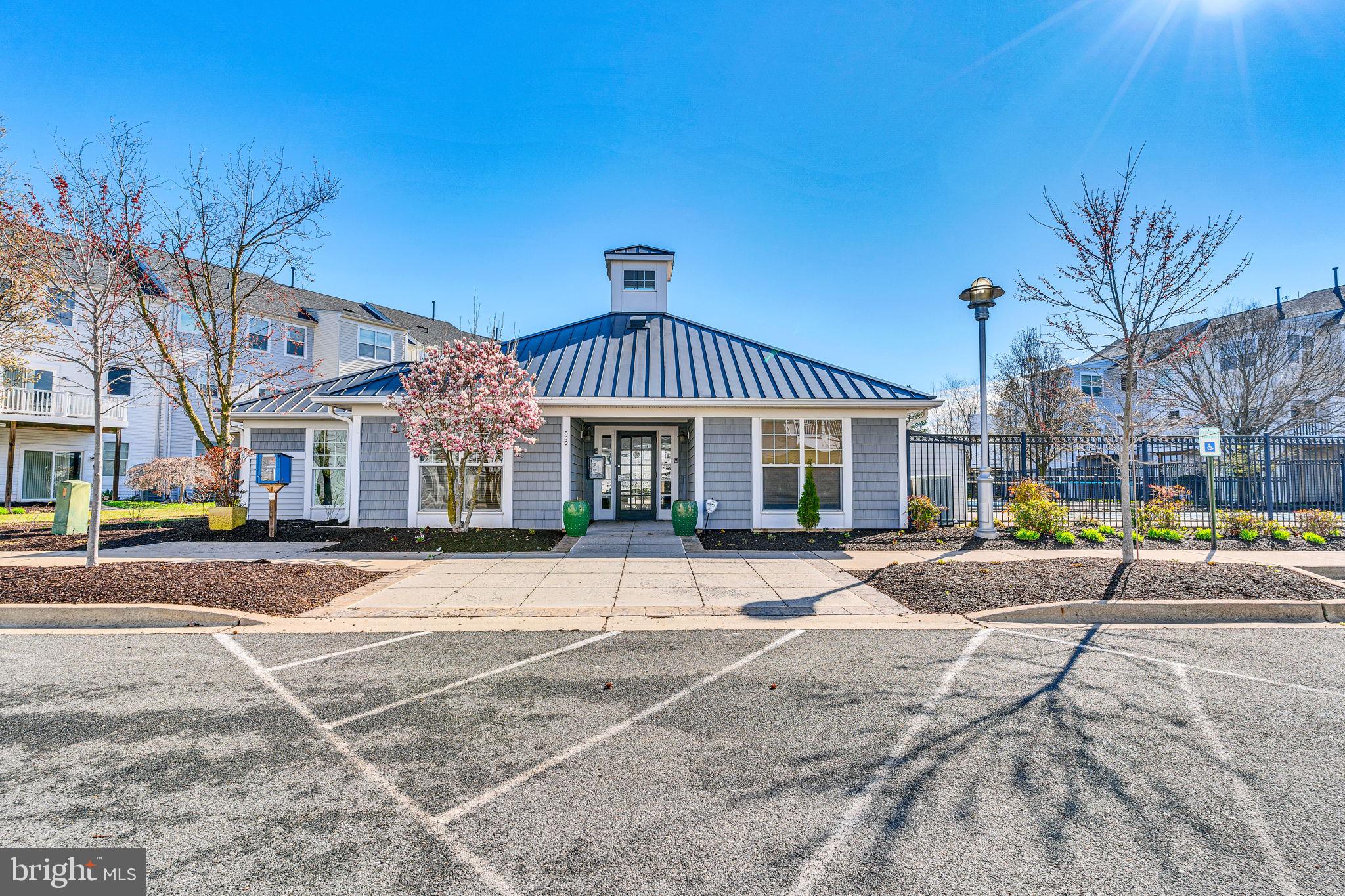 520 Marshy Cove, Unit 163 Cambridge, MD 21613 - Photo 34 of 42 a front view of a building with street view