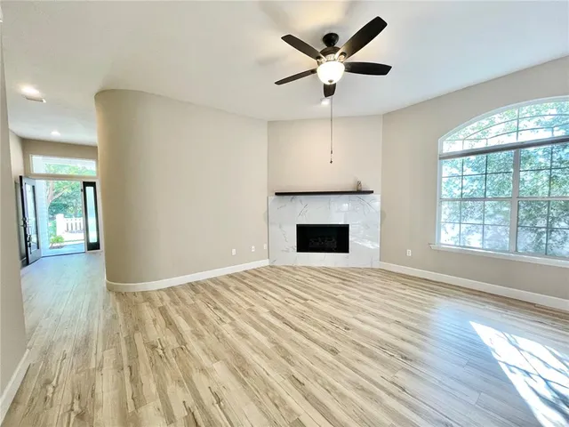 a bedroom with a bed and a fireplace