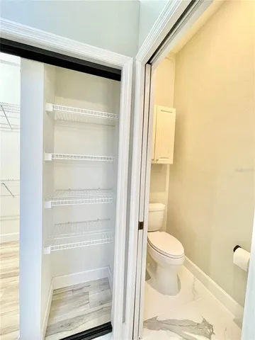 a bathroom with a sink a mirror and shower