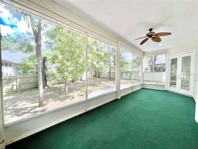 a view of a yard with trees