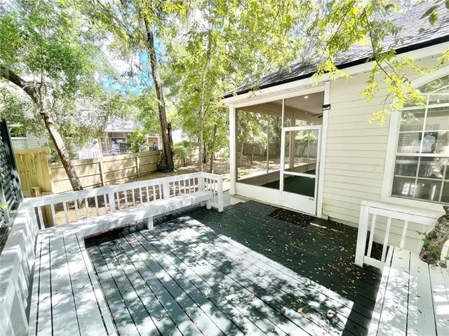 a view of a swimming pool with a yard