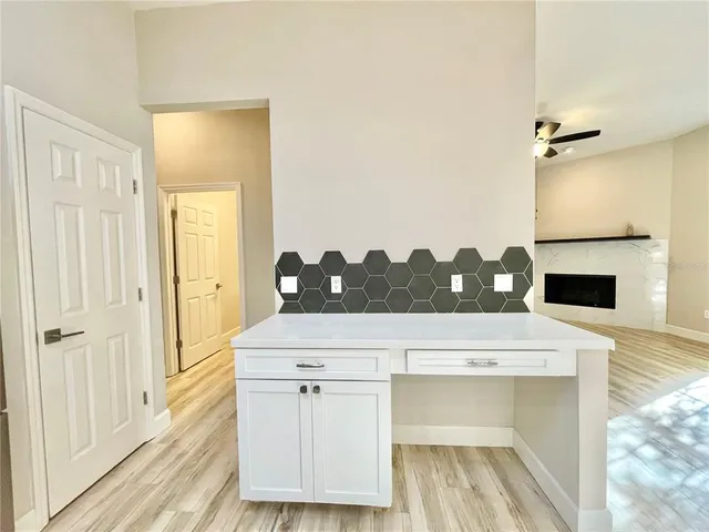 a kitchen with stainless steel appliances a stove and a refrigerator