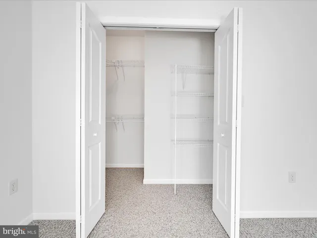 a view of a room with an empty space