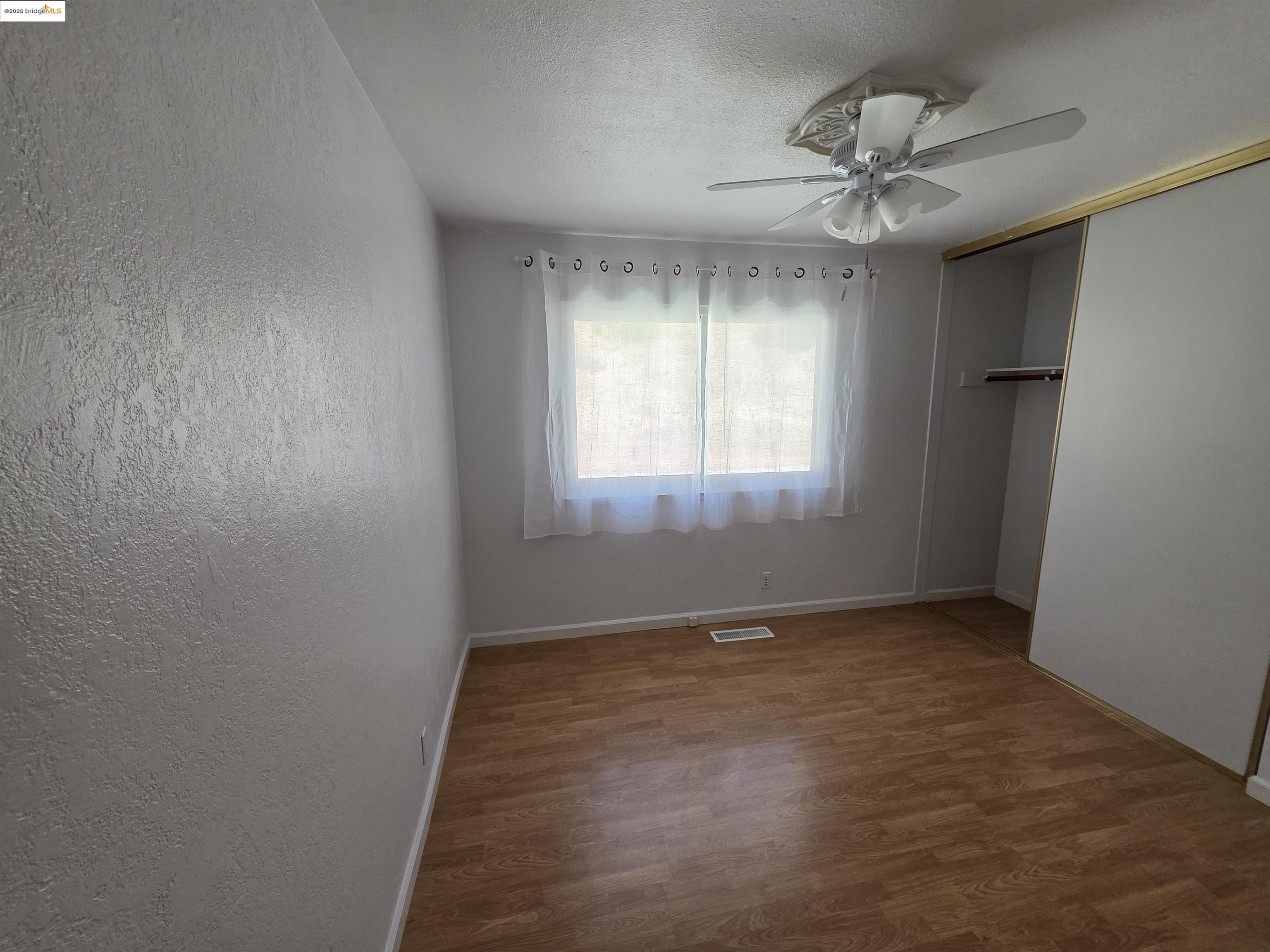 136 Evergreen Way Vallejo, CA 94591 - Photo 17 of 51 a view of an empty room with a window