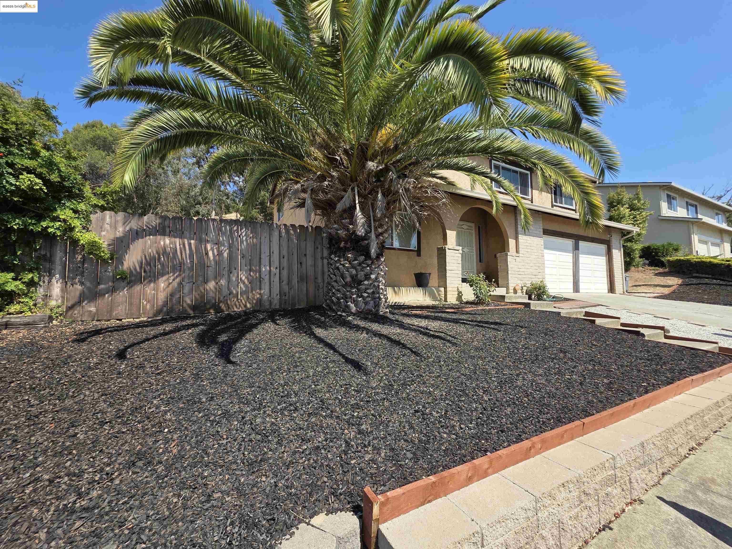 136 Evergreen Way Vallejo, CA 94591 - Photo 2 of 51 a view of a yard with a tree