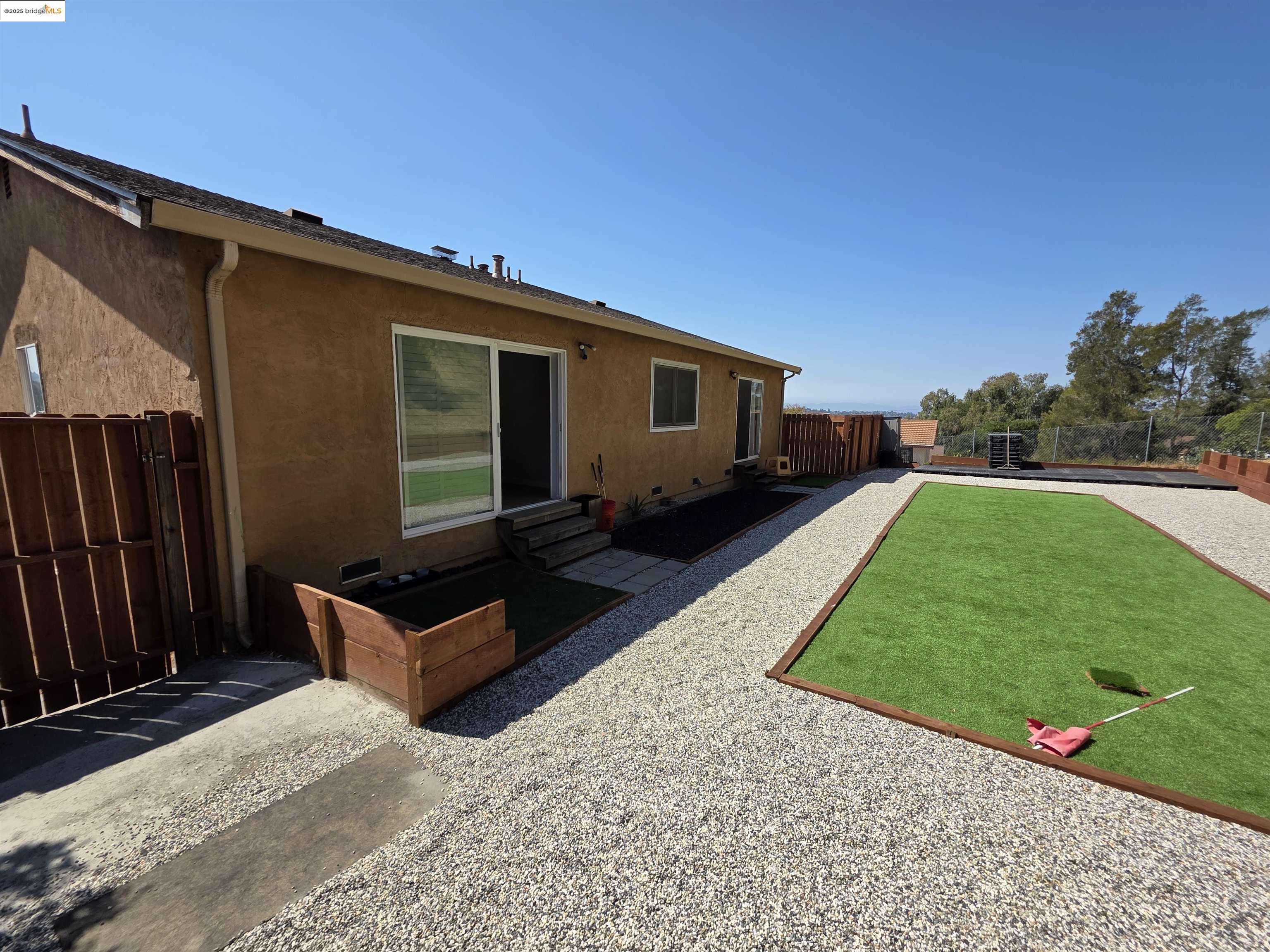 136 Evergreen Way Vallejo, CA 94591 - Photo 32 of 51 a backyard of a house with seating space
