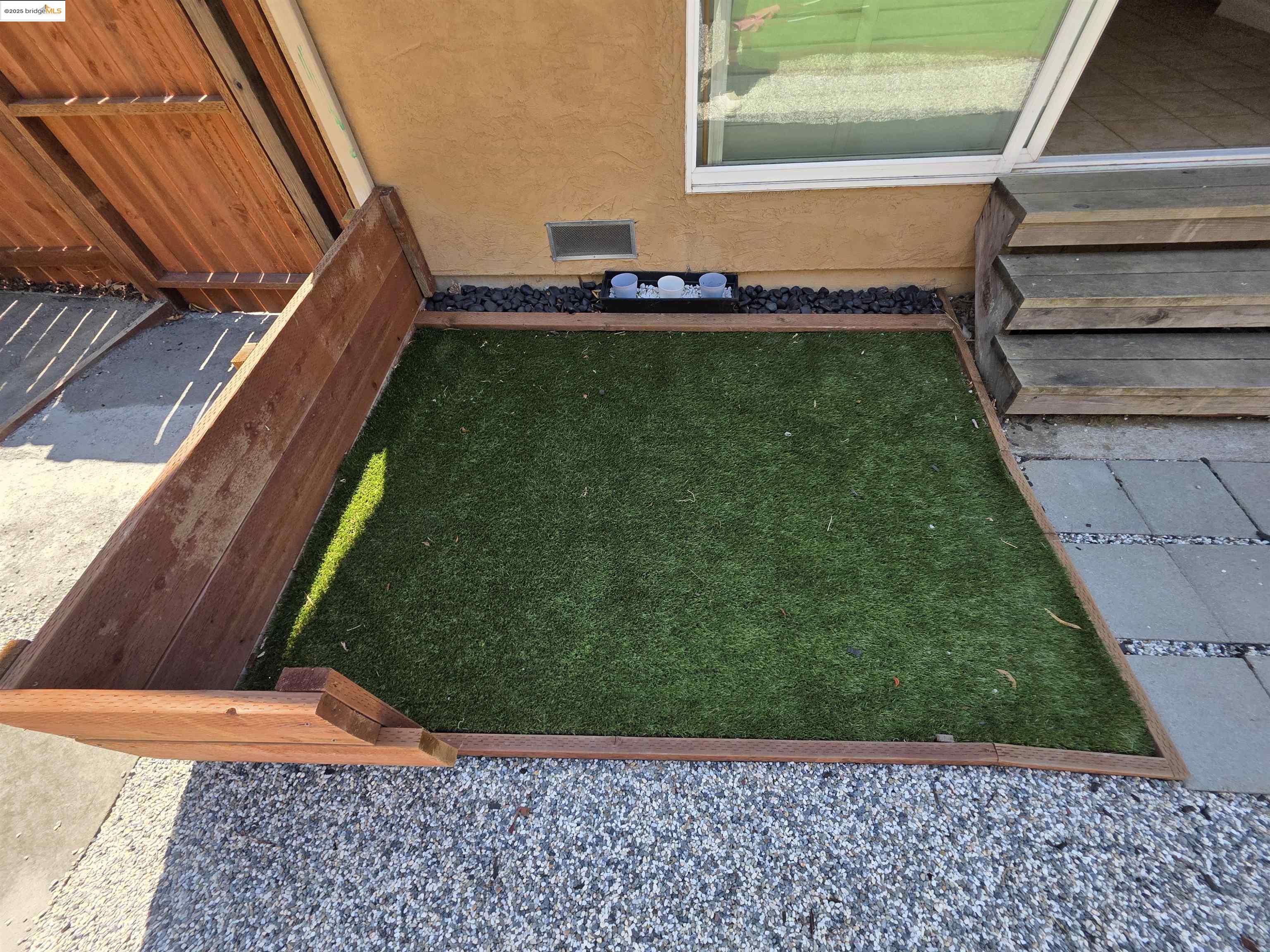 136 Evergreen Way Vallejo, CA 94591 - Photo 35 of 51 a backyard of a house with lots of green space