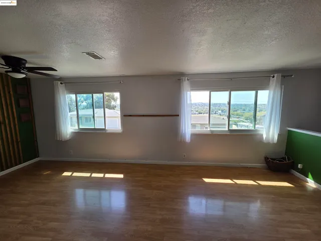 a view of livingroom with hardwood floor and window