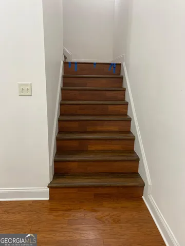 a view of a balcony with furniture