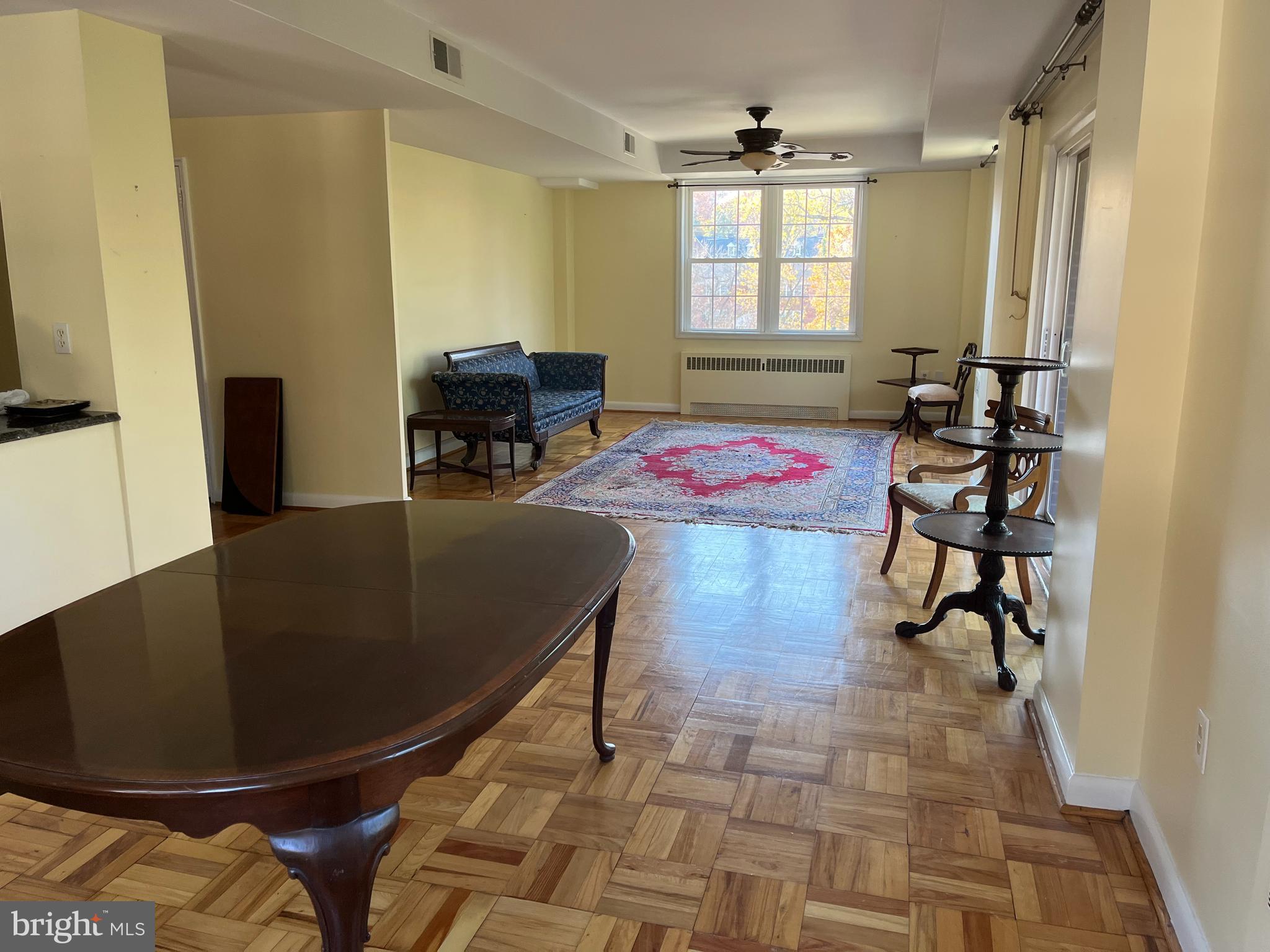 310 Ridgemede Road, Unit 207 Baltimore, MD 21210 - Photo 32 of 32 a dining room with table and chairs