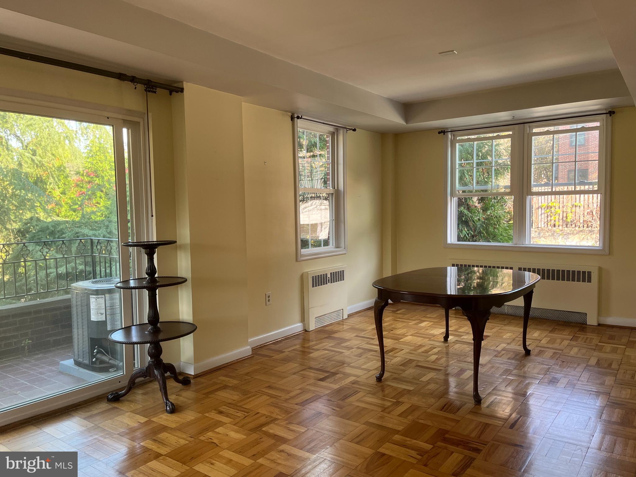 310 Ridgemede Road, Unit 207 Baltimore, MD 21210 - Photo 8 of 32 a view of a livingroom with furniture and a window