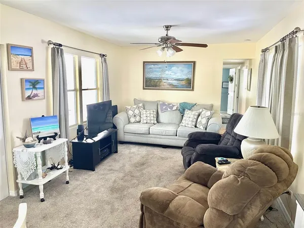 a living room with furniture or couch and a window