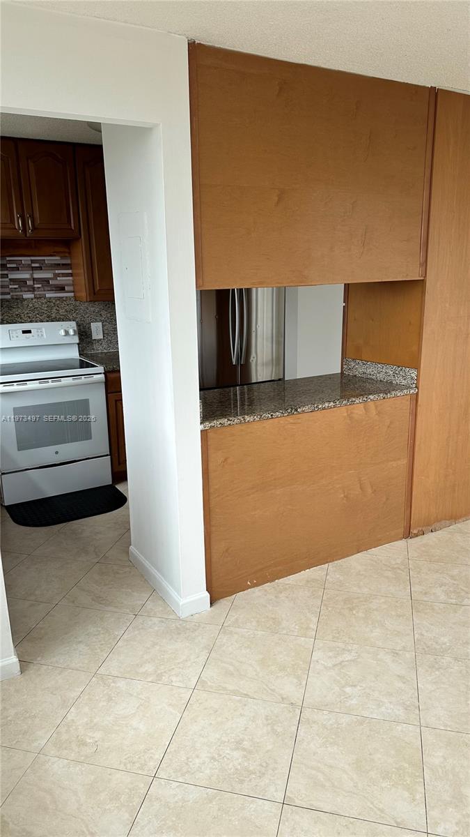 4222 Inverrary Boulevard, Unit 4415 Lauderhill, FL 33319 - Photo 8 of 11 a view of kitchen