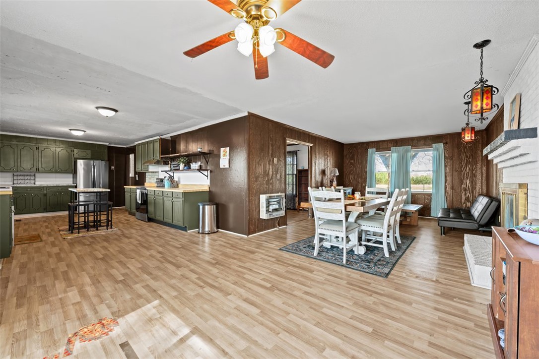 606 County Rd S-1-149 Donalds, SC 29638 - Photo 16 of 38 This inviting space combines kitchen, dining, and living areas for effortless everyday living.
