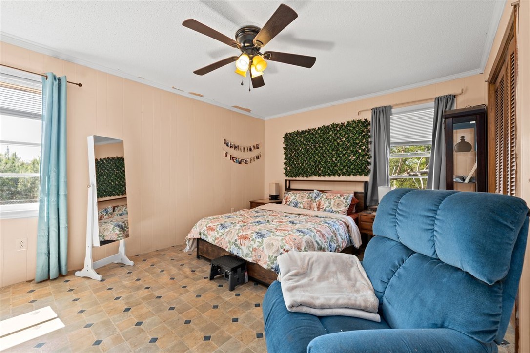 606 County Rd S-1-149 Donalds, SC 29638 - Photo 26 of 38 This cozy bedroom offers a tranquil retreat with ample natural light.