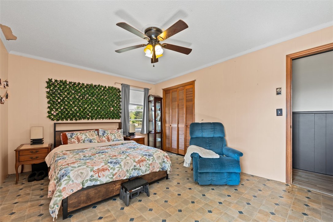606 County Rd S-1-149 Donalds, SC 29638 - Photo 27 of 38 This spacious bedroom offers ample comfort and natural light through its large window.