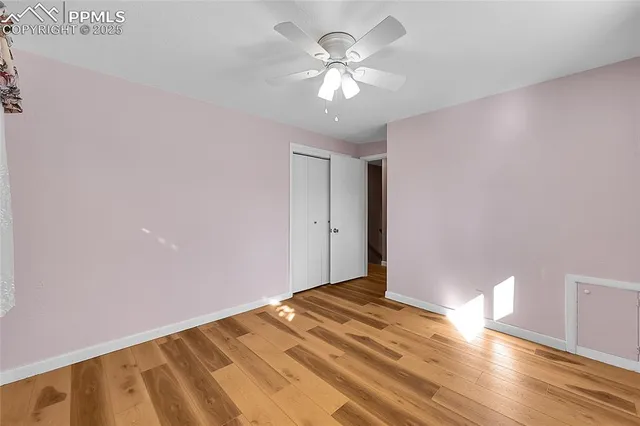 a view of a room with a fan