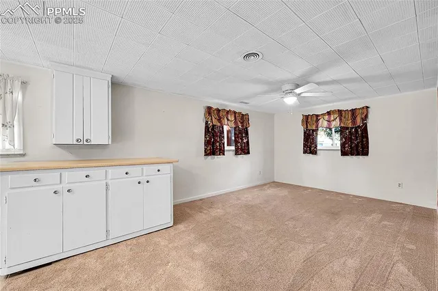 a view of an empty room with window