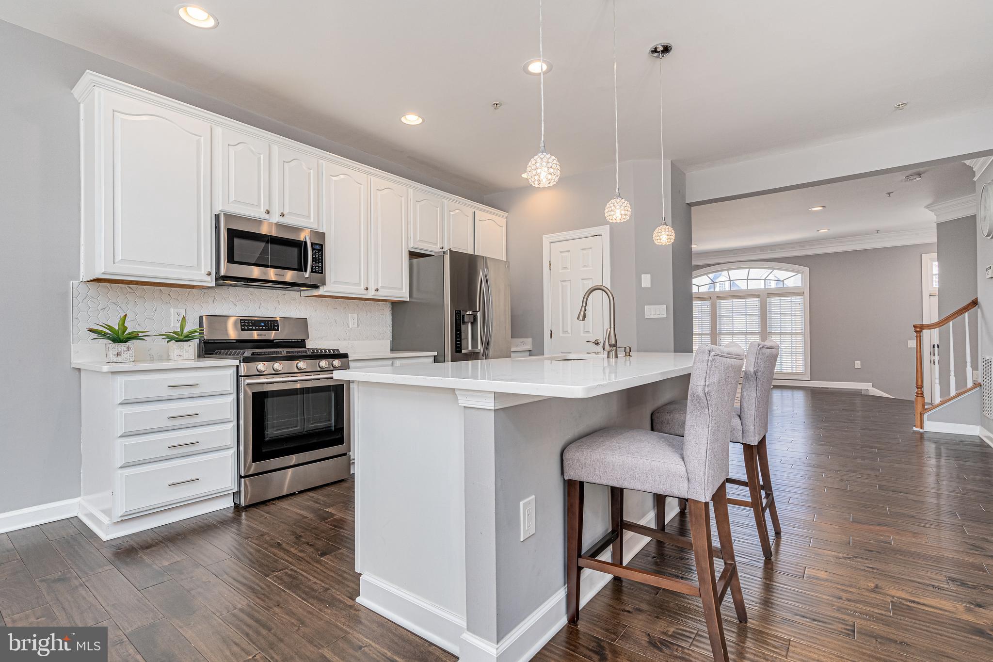 10819 Wadsworth Road Woodstock, MD 21163 - Photo 14 of 52 Recessed lights & pendant lights on Island