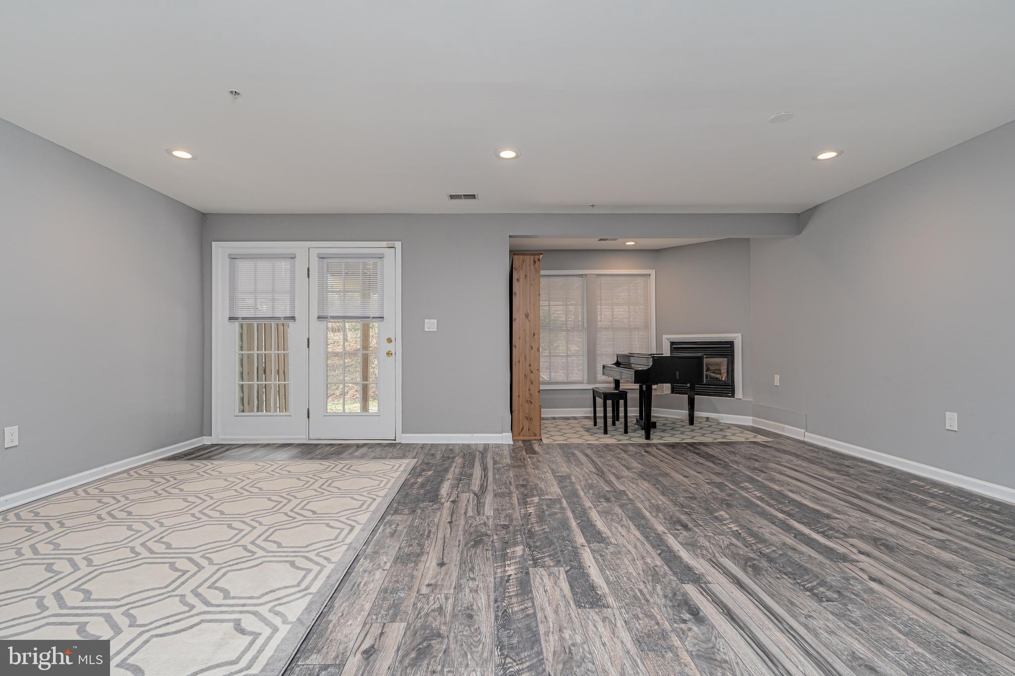 10819 Wadsworth Road Woodstock, MD 21163 - Photo 40 of 52 Large Rec.room w/ Atrium door to level backyard