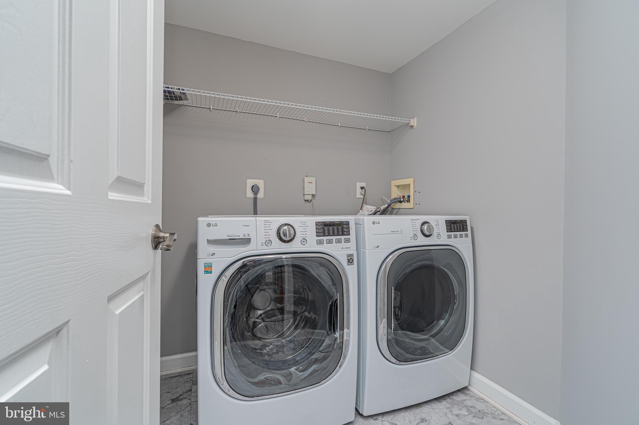 10819 Wadsworth Road Woodstock, MD 21163 - Photo 45 of 52 Newer front load washer and dryer in separate room