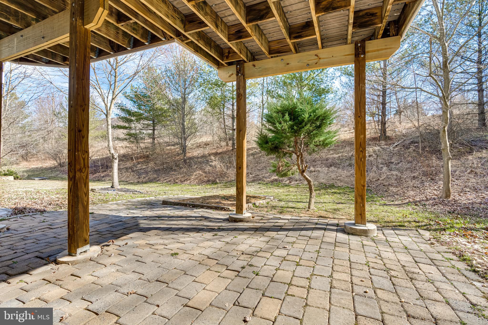10819 Wadsworth Road Woodstock, MD 21163 - Photo 46 of 52 cement brick patio under the deck