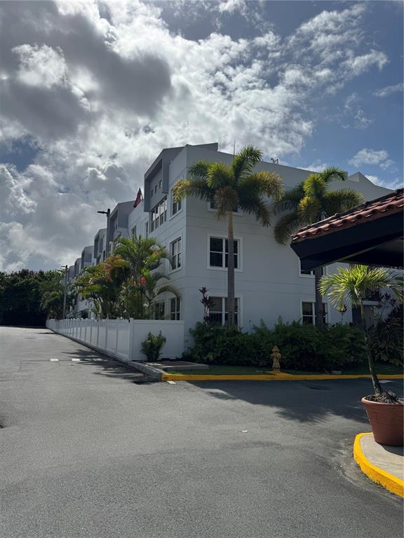 290 Av. Sta. Ana Guaynabo, Bayamón 00969 - Photo 23 of 23 a front view of house with yard and green space