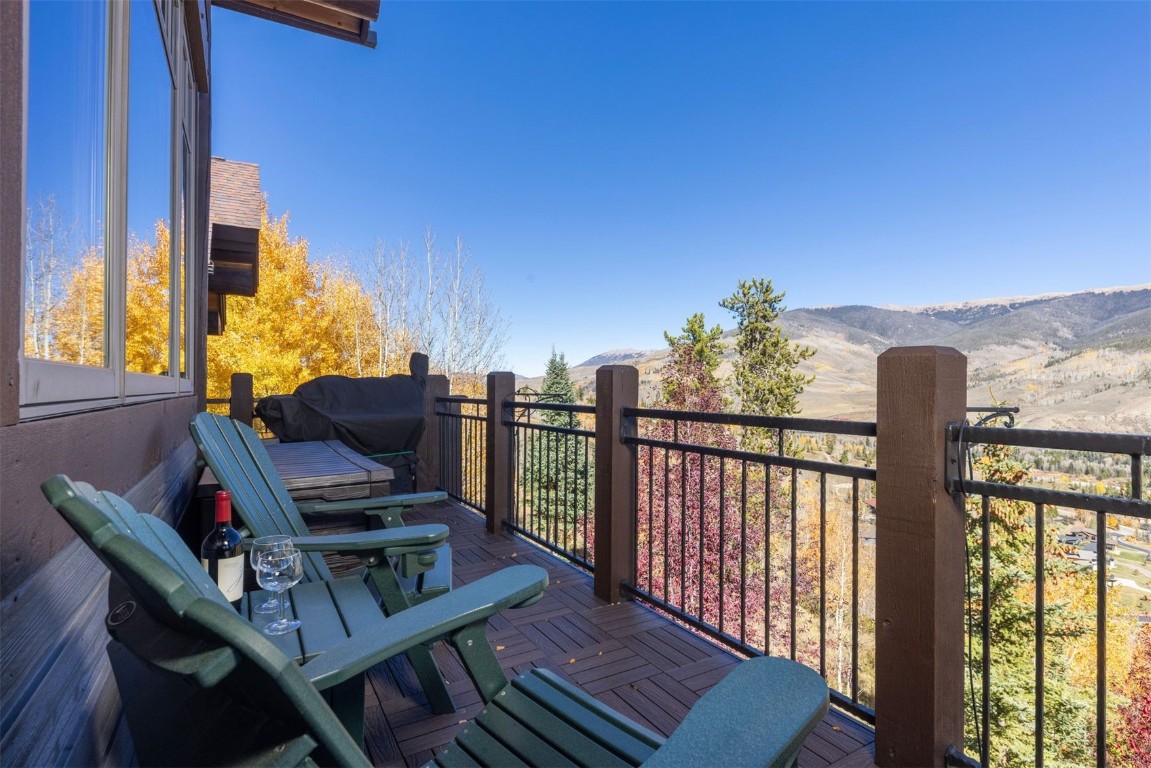 1330 Golden Eagle Road Silverthorne, CO 80498 - Photo 11 of 41 a view of balcony with wooden floor and seating space