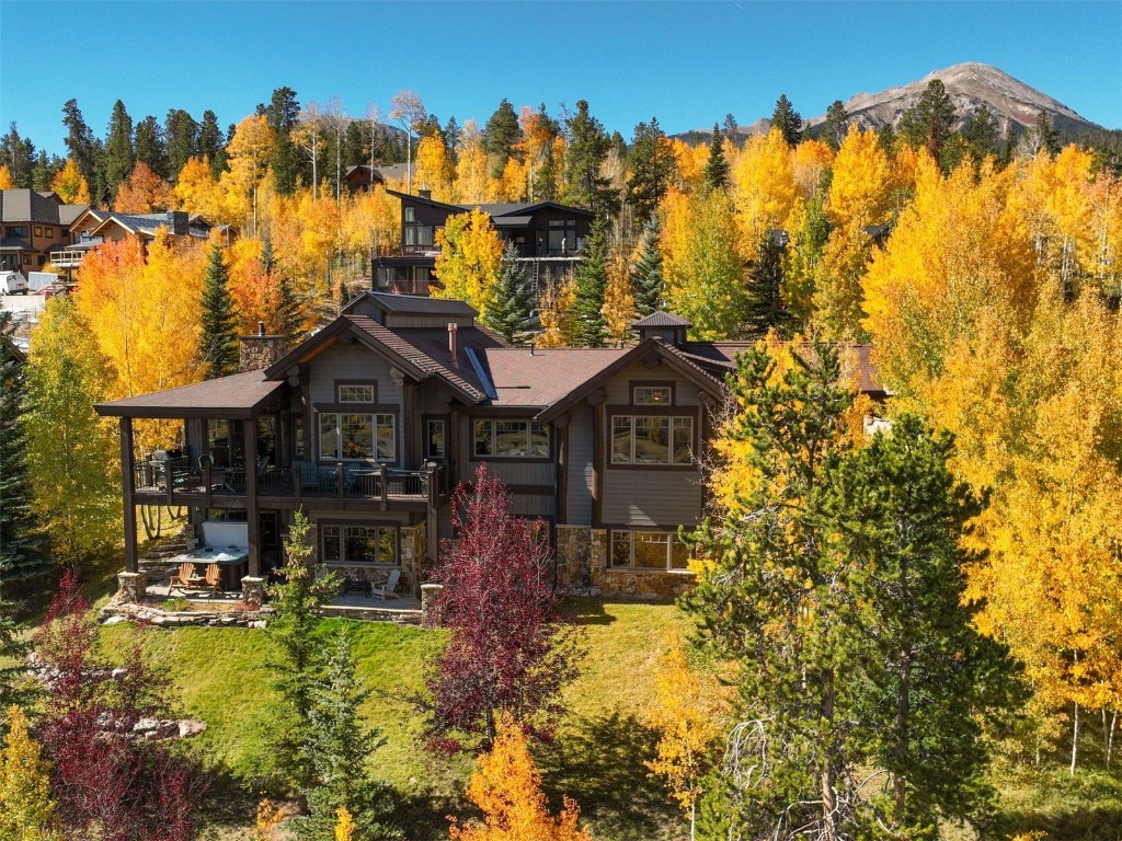 1330 Golden Eagle Road Silverthorne, CO 80498 - Photo 18 of 41 a front view of house with a yard