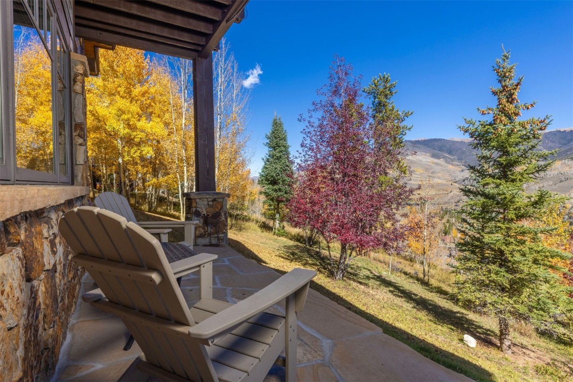 1330 Golden Eagle Road Silverthorne, CO 80498 - Photo 32 of 41 a view of balcony with furniture and garden
