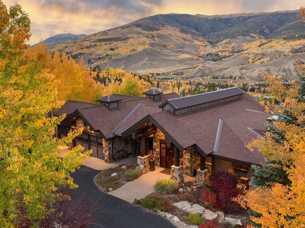 1330 Golden Eagle Road Silverthorne, CO 80498 - Photo 40 of 41 a view of house with yard and mountain view in back