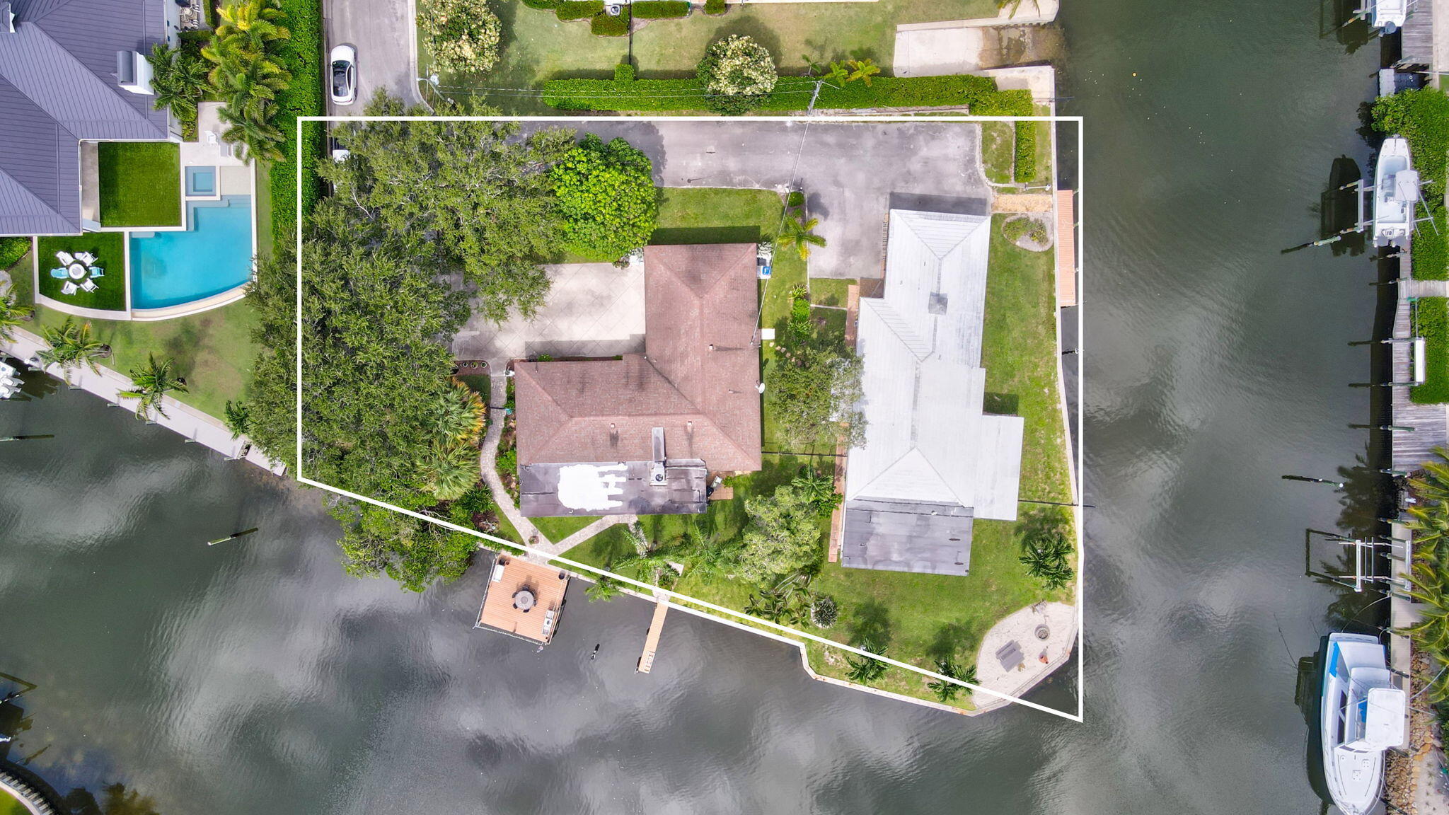 207 Body Court Jupiter, FL 33477 - Photo 2 of 37 Corner lot 300ft of waterfront