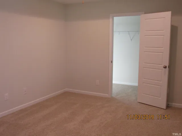 an empty room with cabinet
