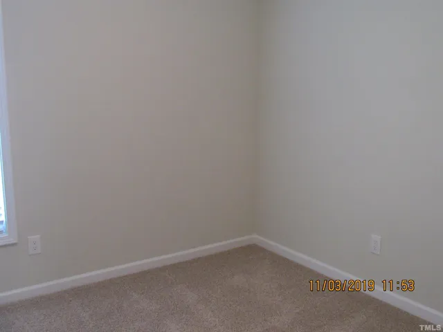 a view of a room that has a window in it