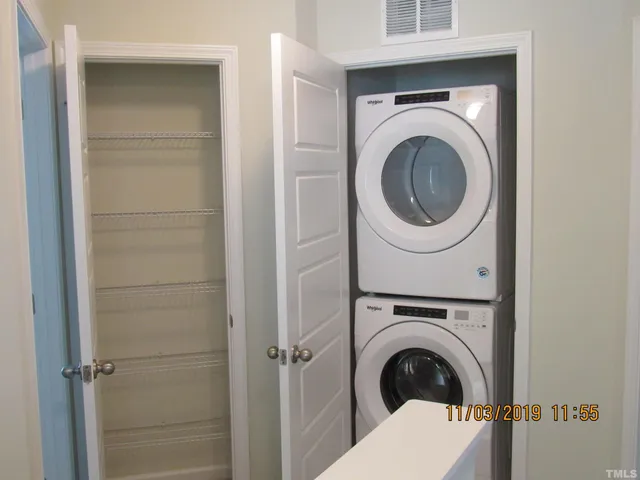 a view of backyard with seating space