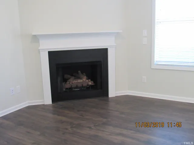 a room with a fireplace